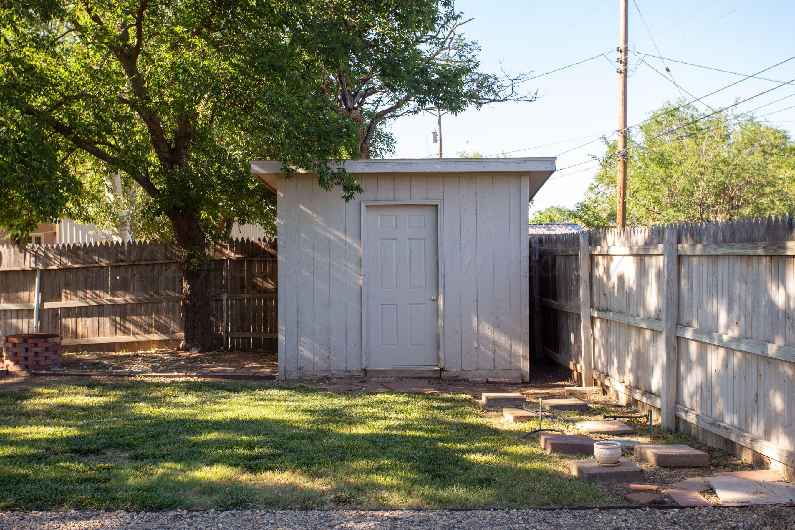 4406 South Bonham Street Amarillo, TX 79110 - Photo 23 of 26 a view of a house with a yard