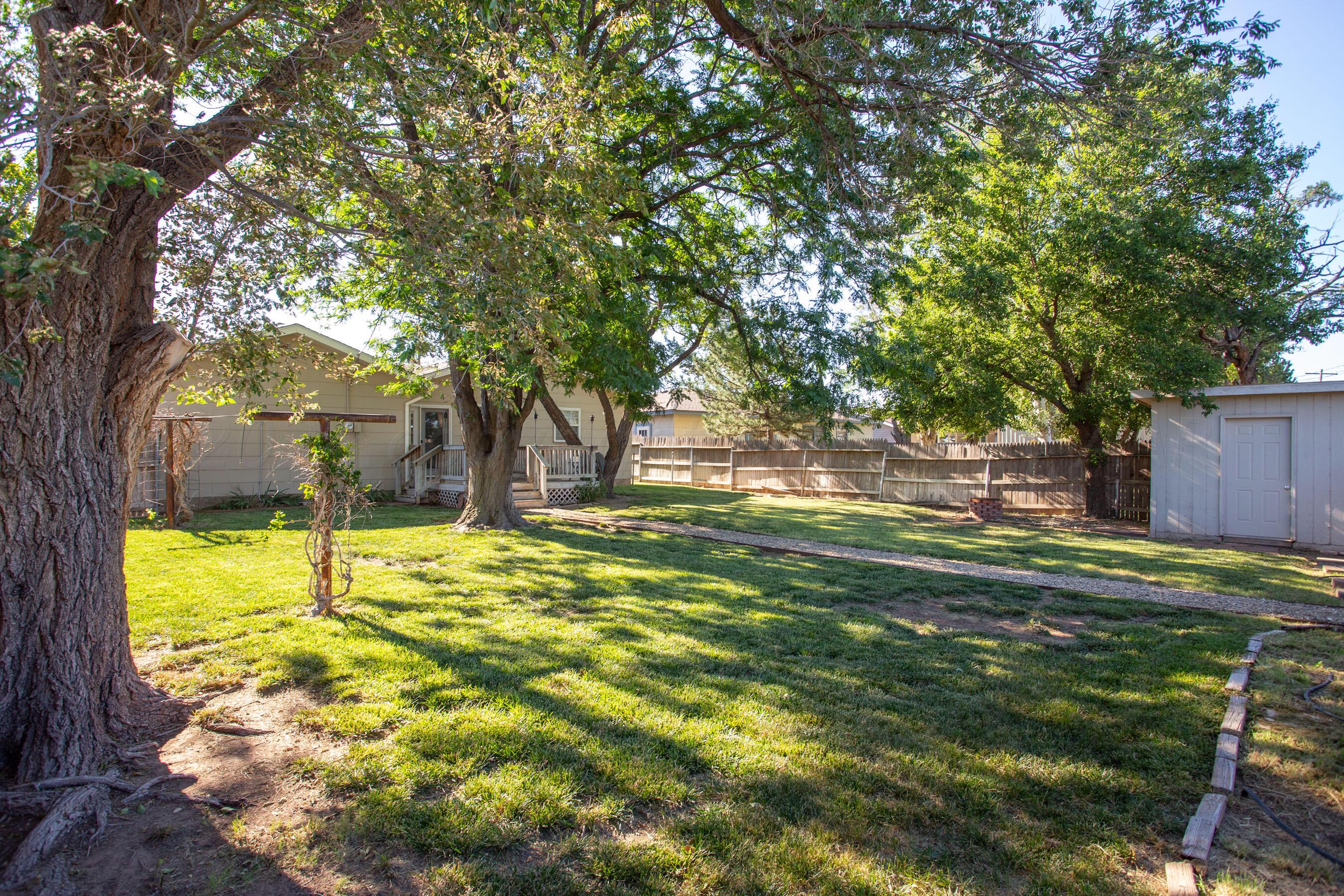 4406 South Bonham Street Amarillo, TX 79110 - Photo 24 of 26 a view of a swimming pool with a patio