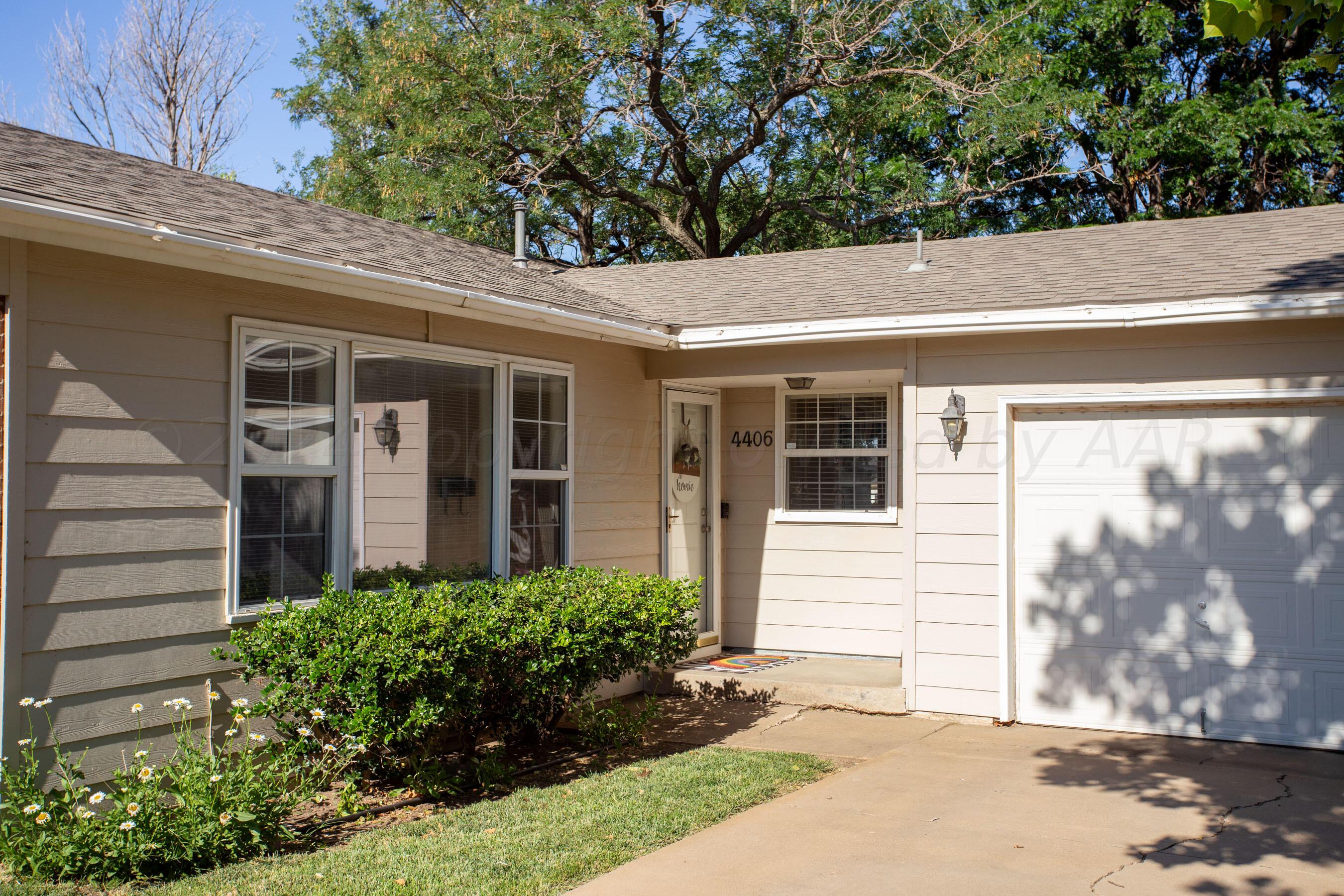 4406 South Bonham Street Amarillo, TX 79110 - Photo 3 of 26 a view of a house with a yard