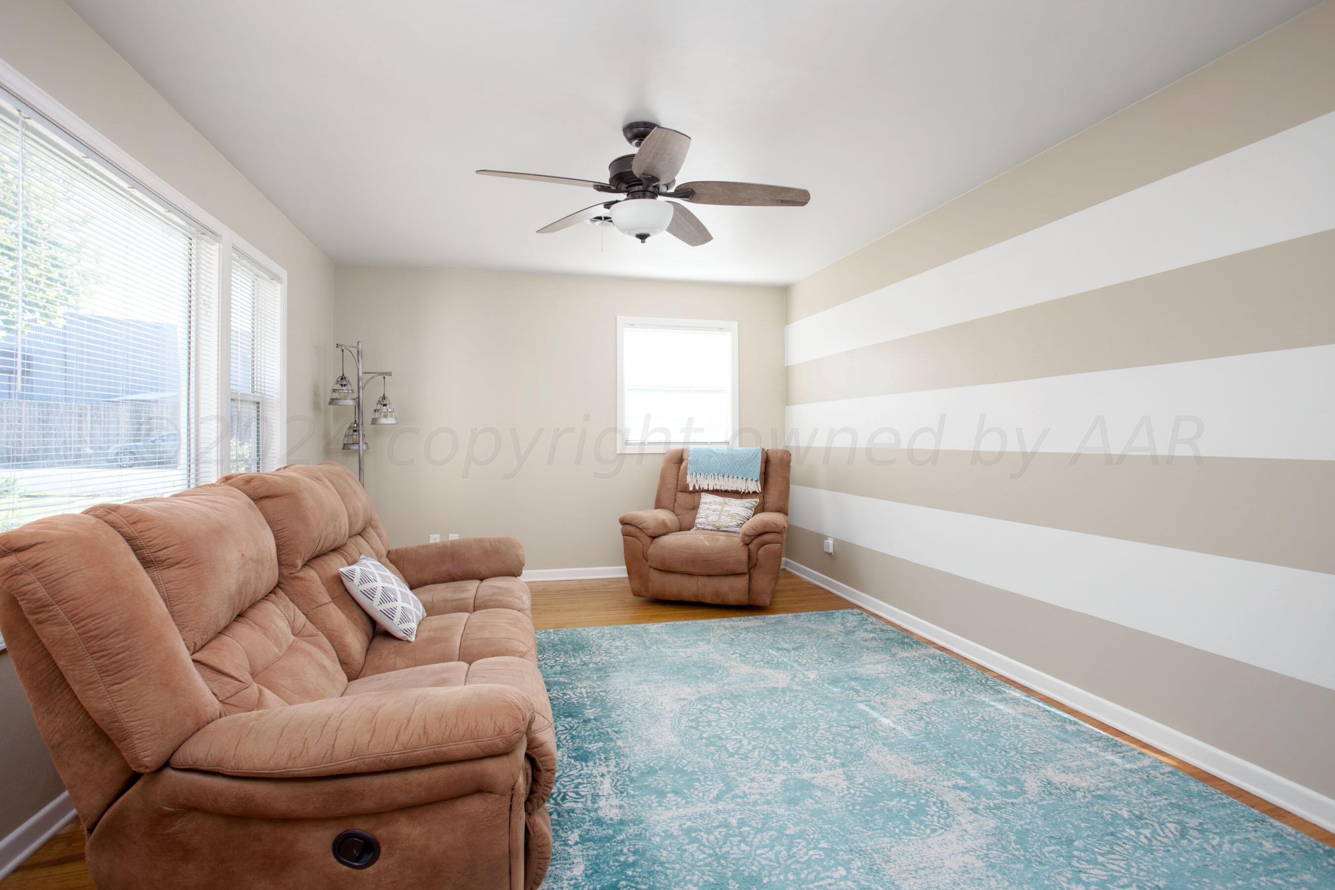 4406 South Bonham Street Amarillo, TX 79110 - Photo 4 of 26 a living room with furniture and a large window