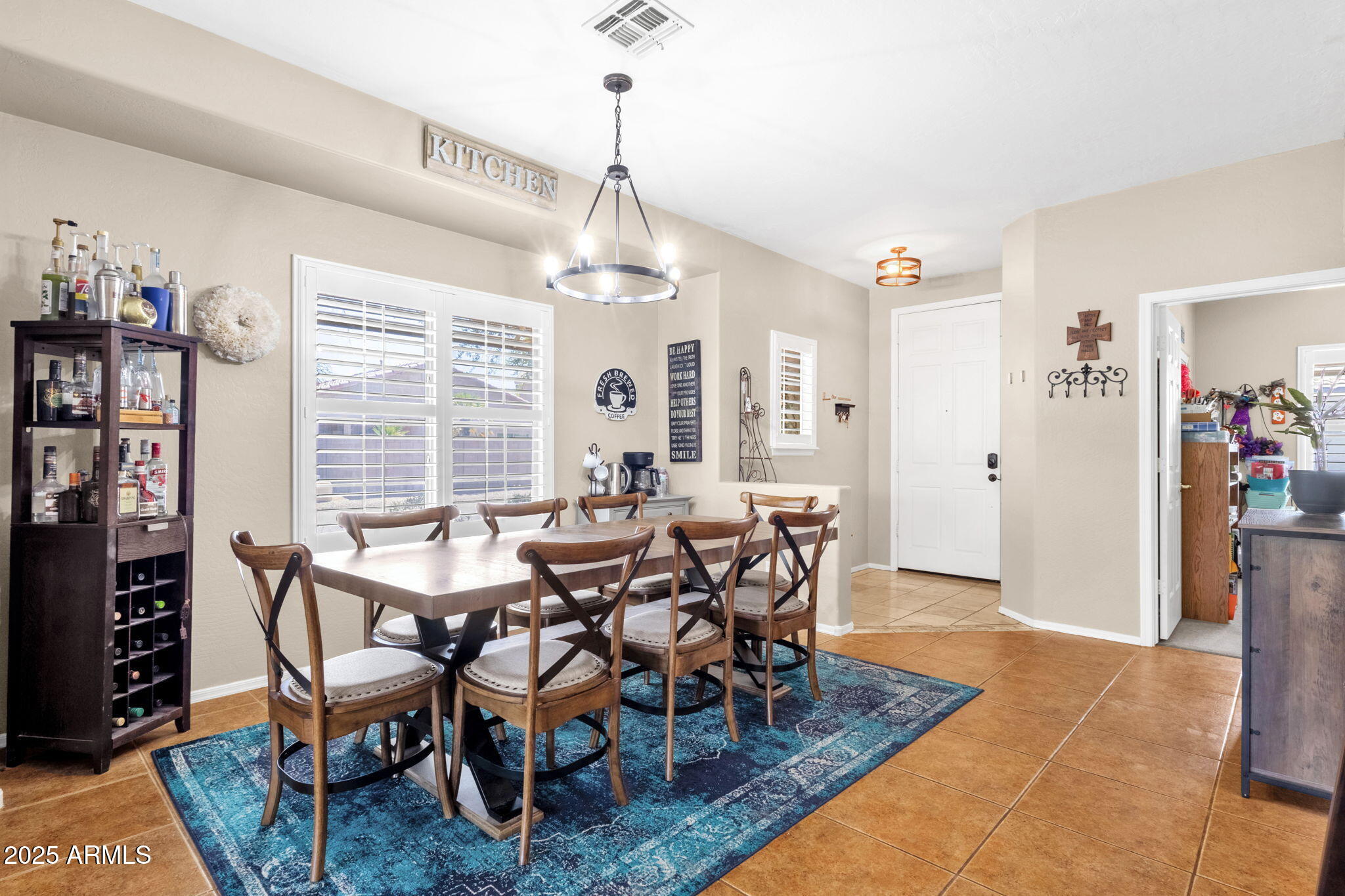 6456 South Nash Way Chandler, AZ 85249 - Photo 14 of 57 a view of a dining room with furniture