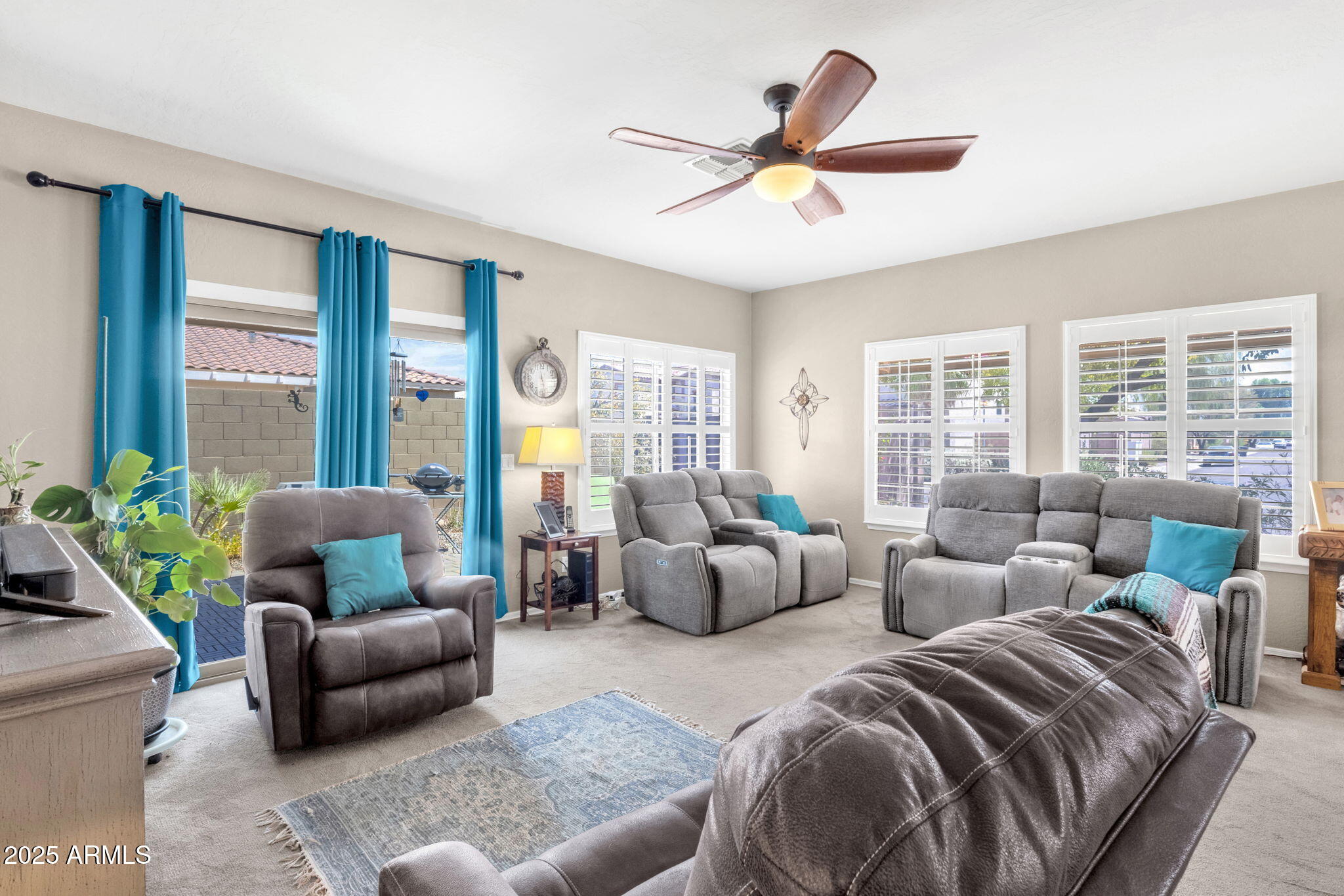 6456 South Nash Way Chandler, AZ 85249 - Photo 19 of 57 a living room with furniture and windows