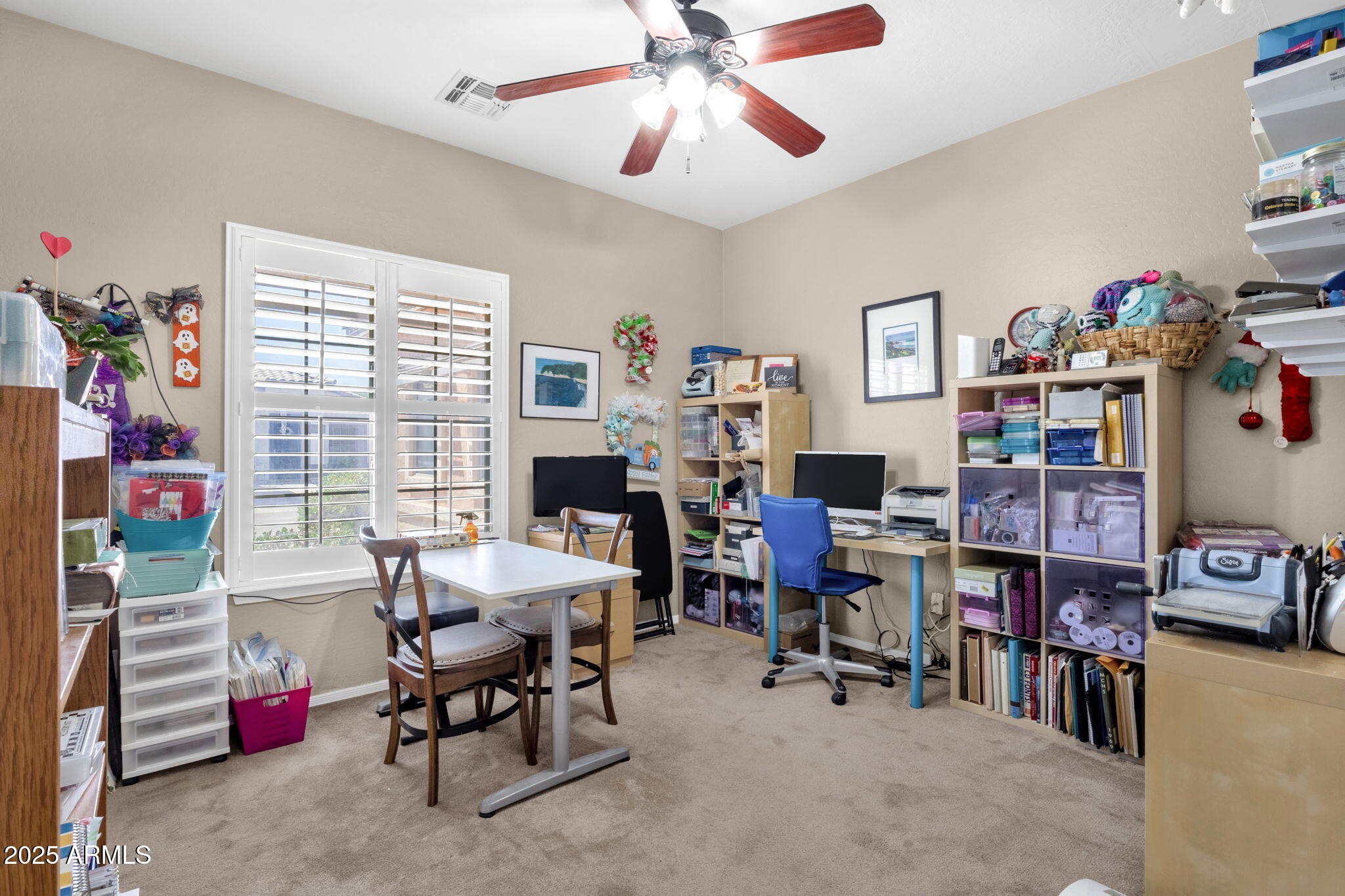 6456 South Nash Way Chandler, AZ 85249 - Photo 24 of 57 a view of a workspace with furniture and a window