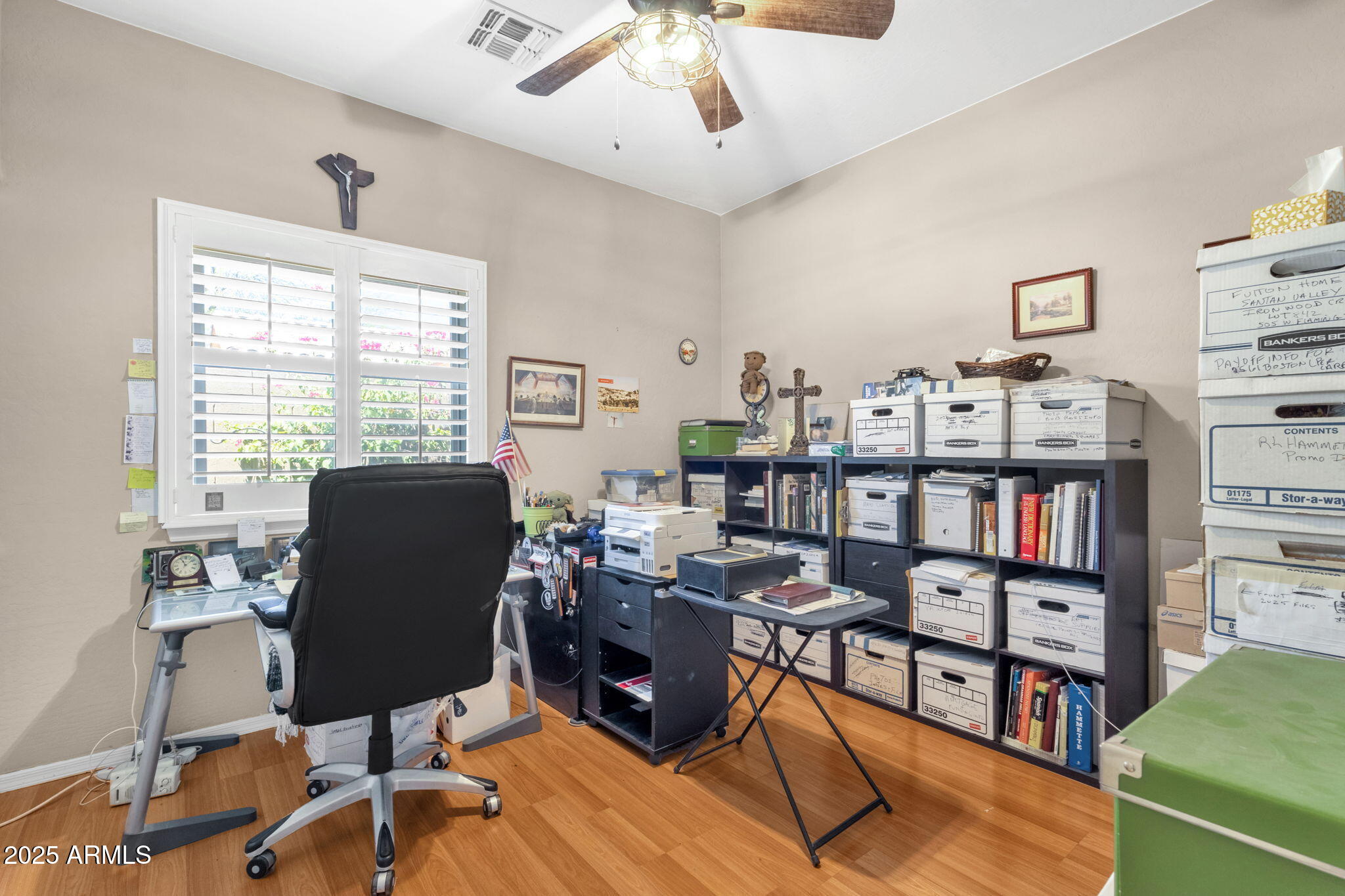 6456 South Nash Way Chandler, AZ 85249 - Photo 26 of 57 a view of a workspace with furniture and a window