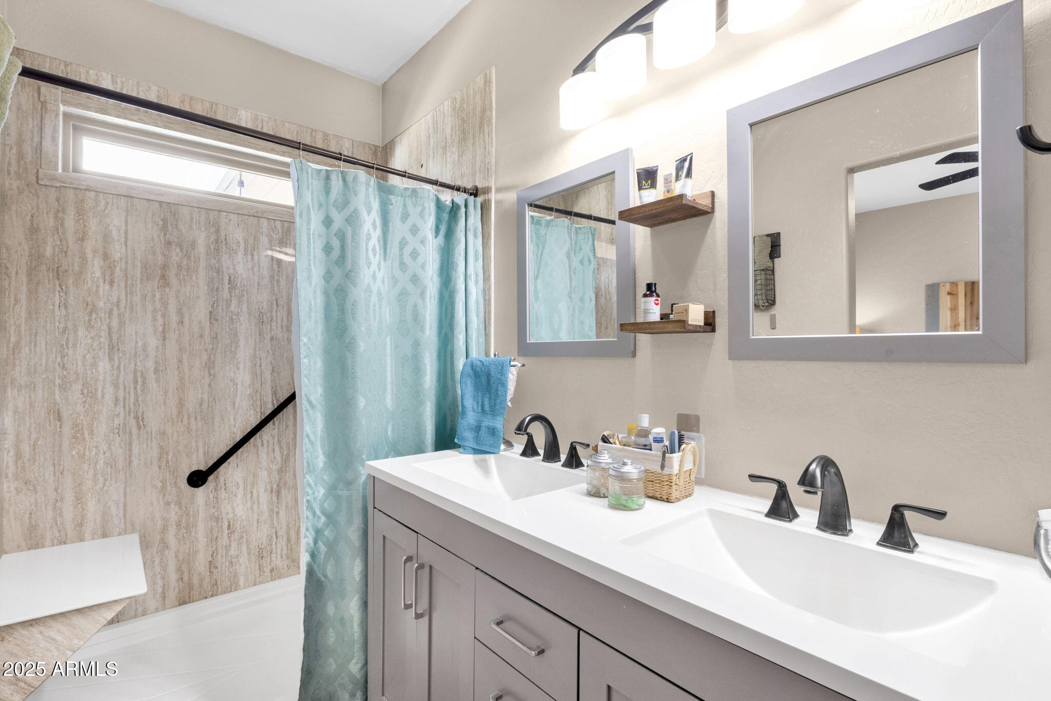 6456 South Nash Way Chandler, AZ 85249 - Photo 31 of 57 a bathroom with a double vanity sink and a mirror