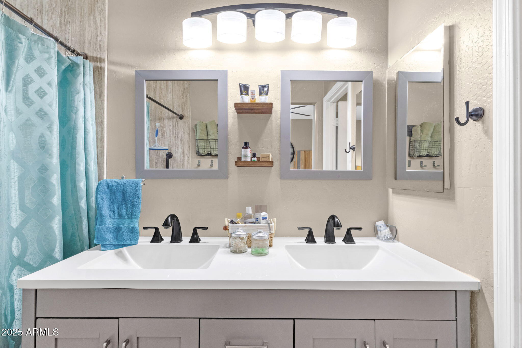 6456 South Nash Way Chandler, AZ 85249 - Photo 32 of 57 a bathroom with a sink and a mirror