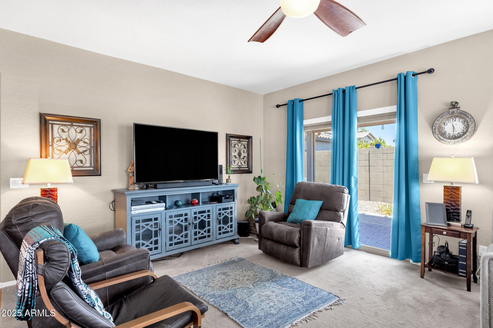 6456 South Nash Way Chandler, AZ 85249 - Photo 4 of 57 a living room with furniture and a flat screen tv