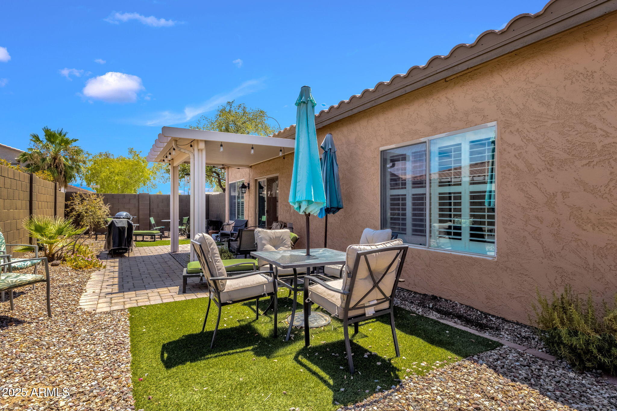 6456 South Nash Way Chandler, AZ 85249 - Photo 41 of 57 a view of a house with backyard and sitting area
