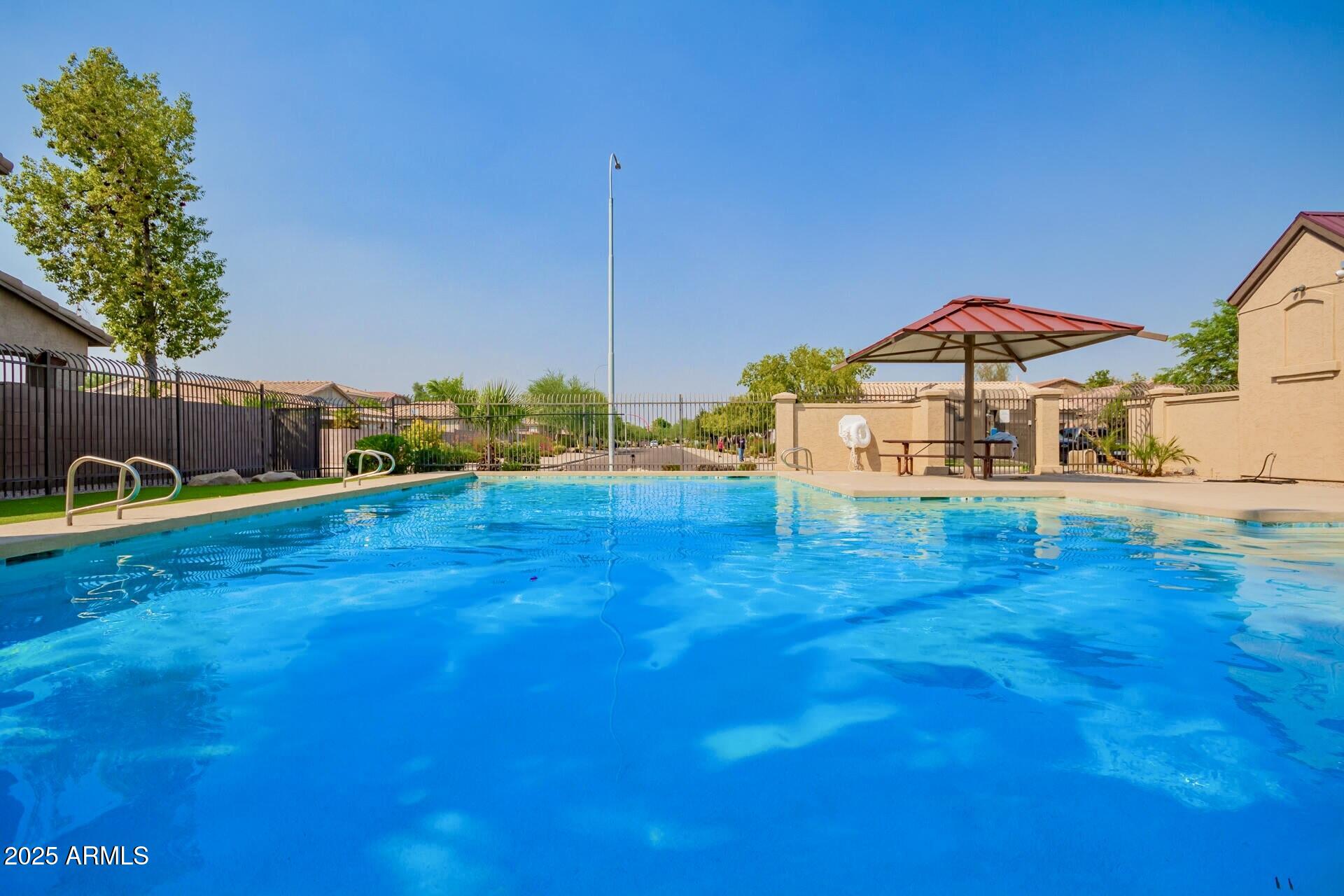 6456 South Nash Way Chandler, AZ 85249 - Photo 42 of 57 a view of a house with a yard