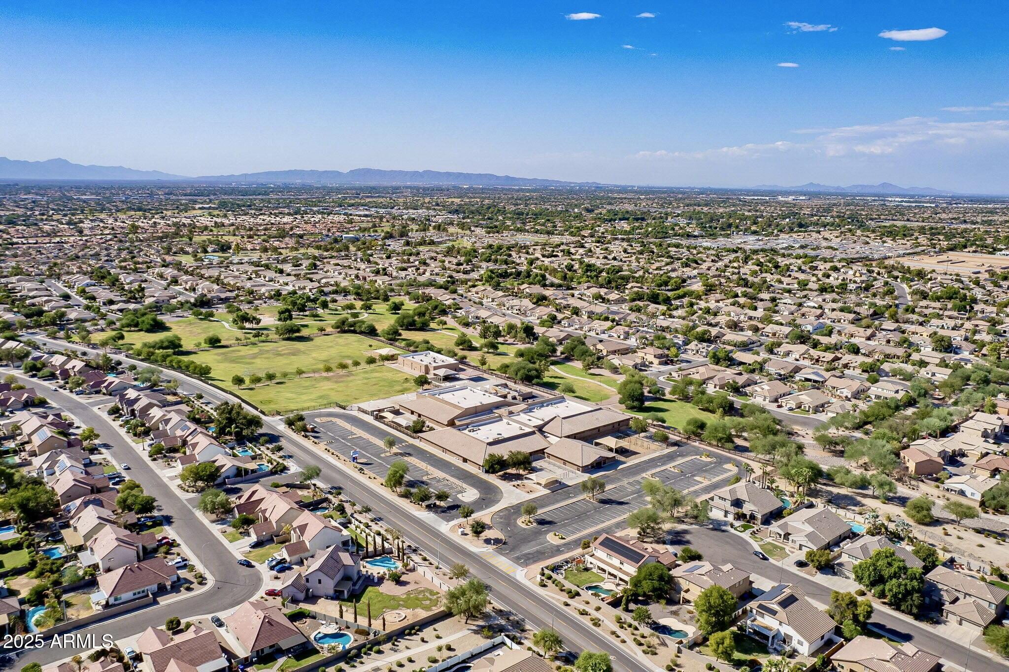 6456 South Nash Way Chandler, AZ 85249 - Photo 46 of 57 an aerial view of a city with lots of residential buildings