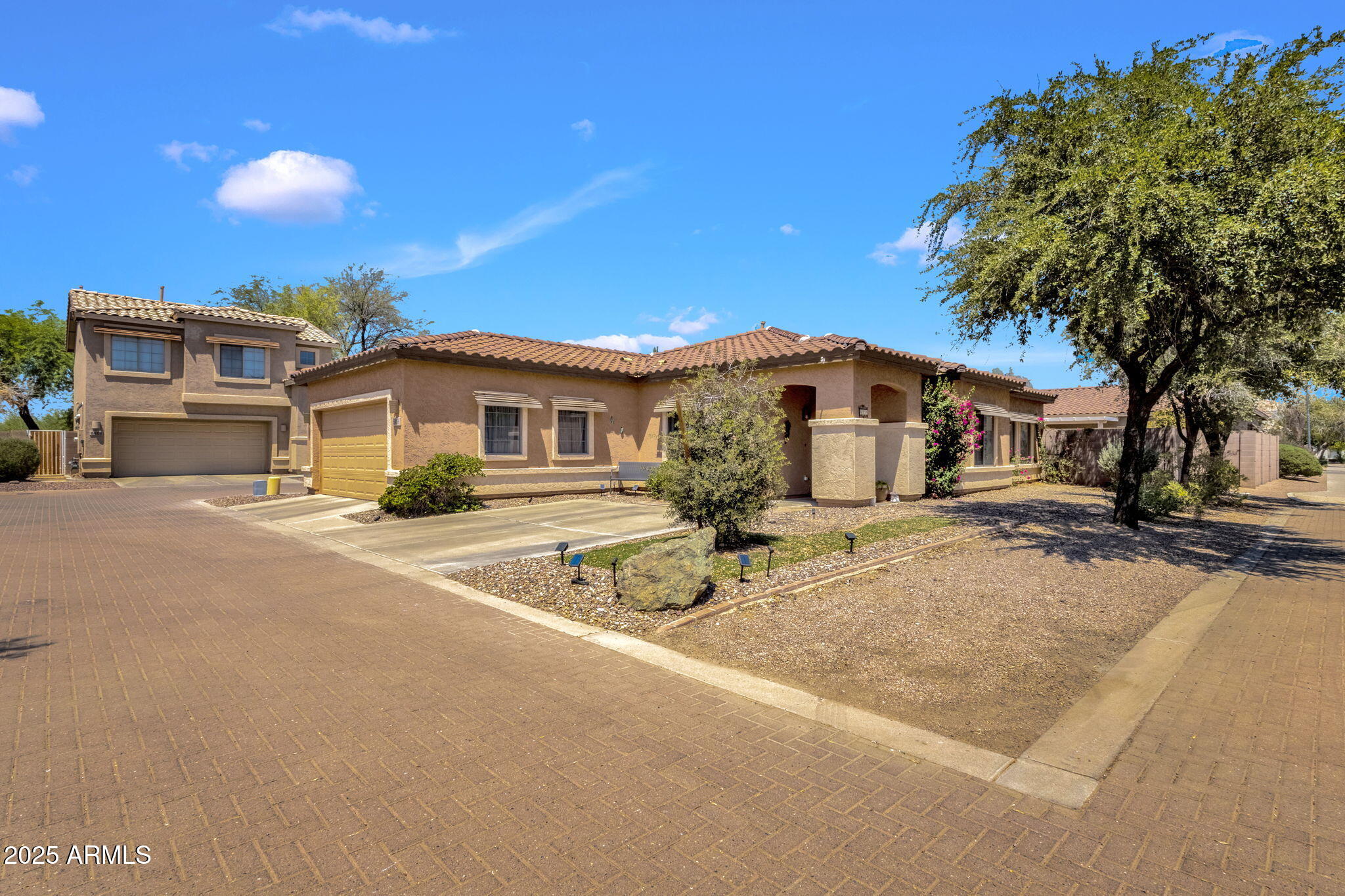 6456 South Nash Way Chandler, AZ 85249 - Photo 6 of 57 a front view of a house with a yard