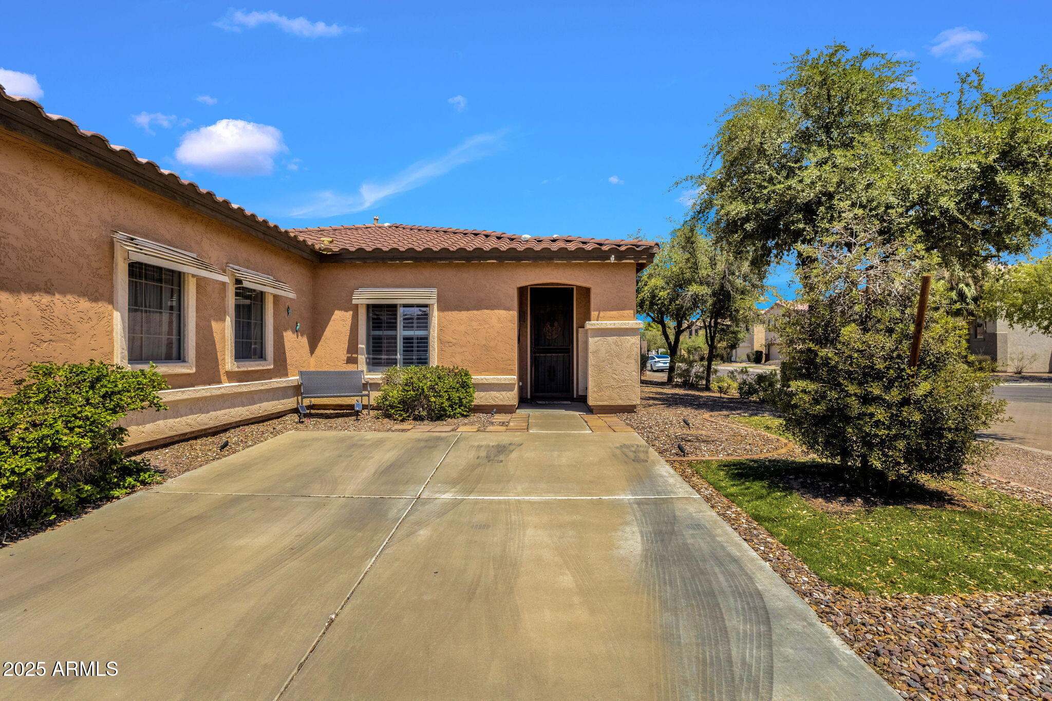 6456 South Nash Way Chandler, AZ 85249 - Photo 9 of 57 a view of a house with a yard and potted plants