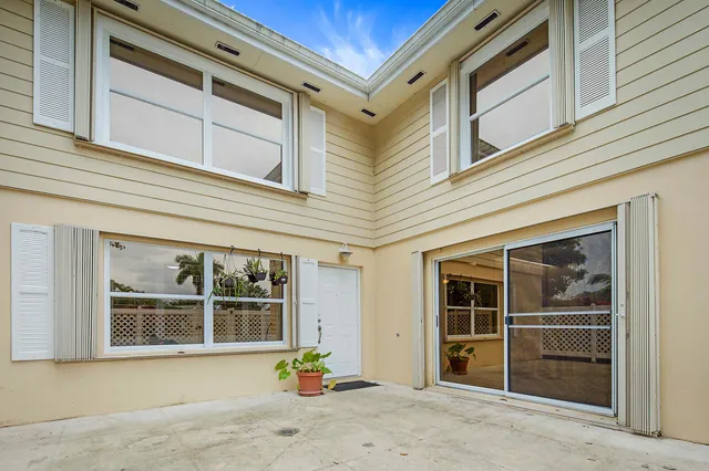 a front view of a house with a garage