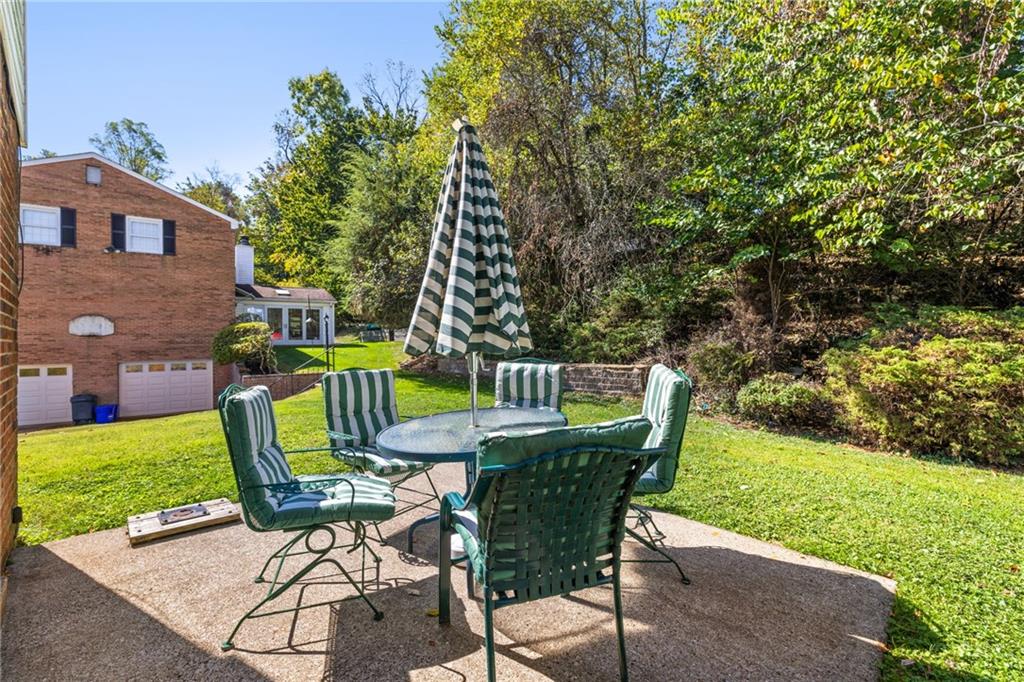 110 Atterbury Road Monroeville, PA 15146 - Photo 35 of 36 a view of a chairs and table in backyard of the house