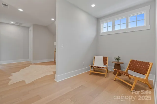 a room with furniture and a window