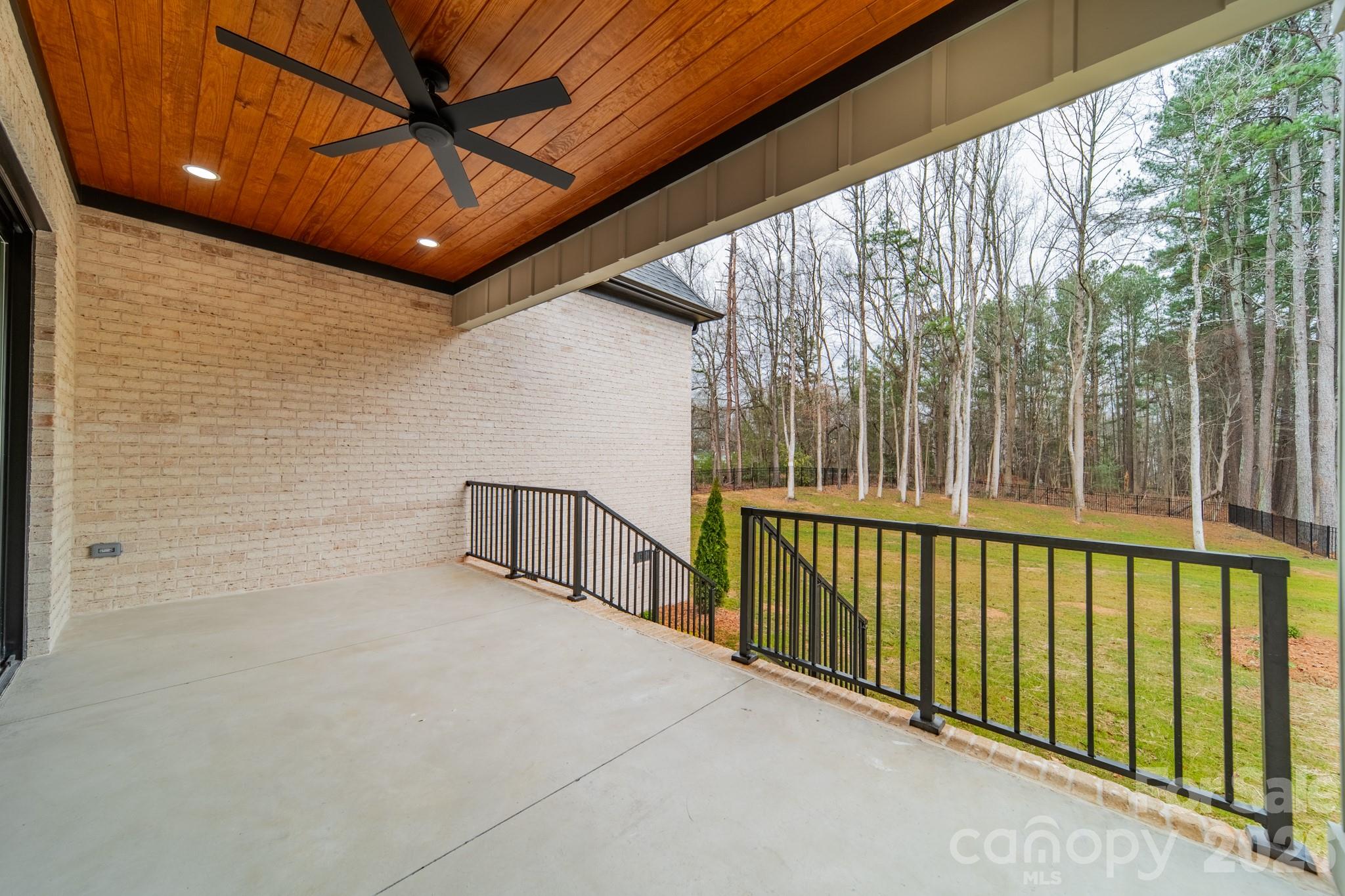 6805 Weddington Matthews Road Weddington, NC 28104 - Photo 18 of 38 a view of a porch with wooden floor