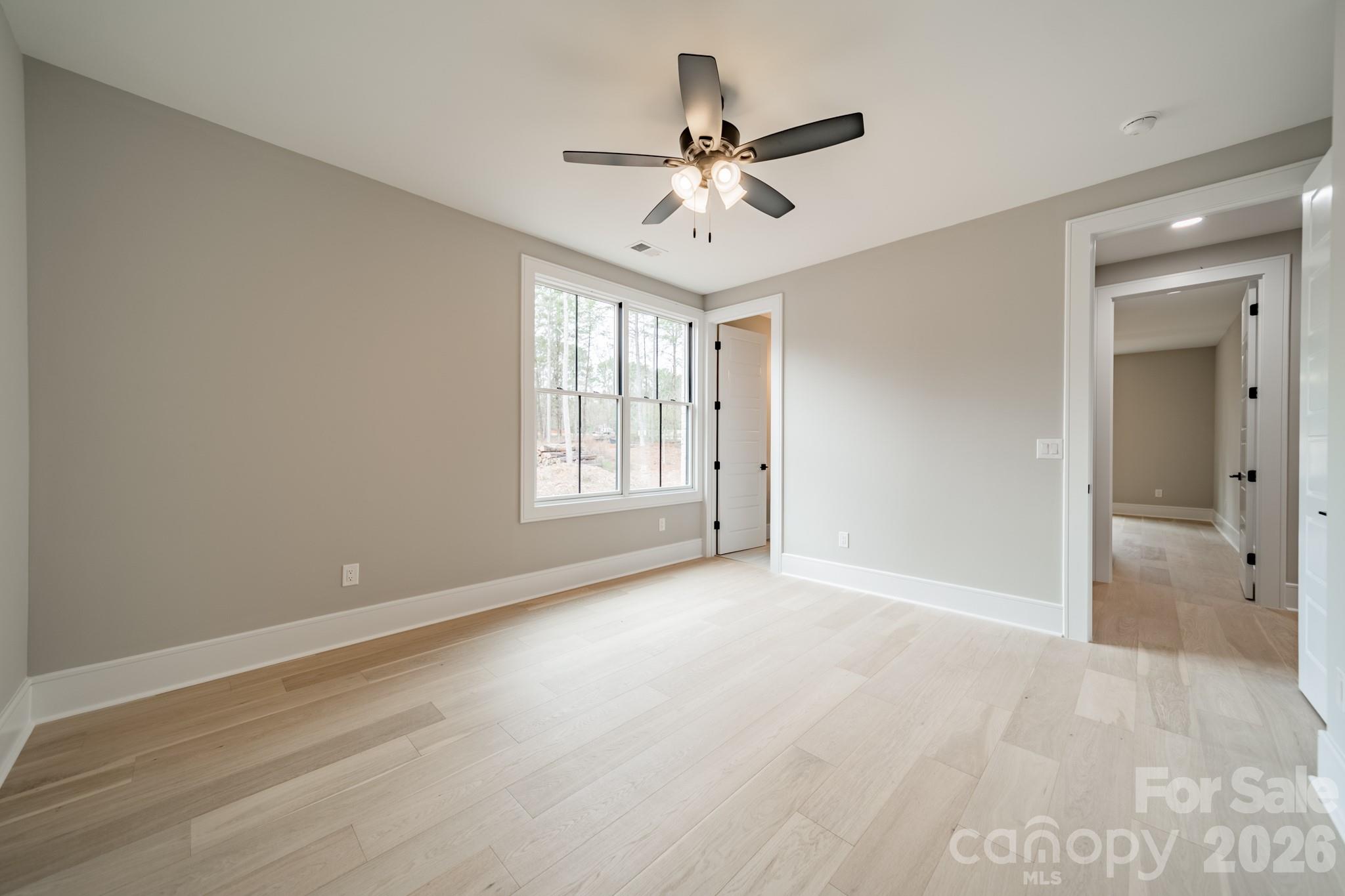 6805 Weddington Matthews Road Weddington, NC 28104 - Photo 32 of 38 a view of an empty room with a window