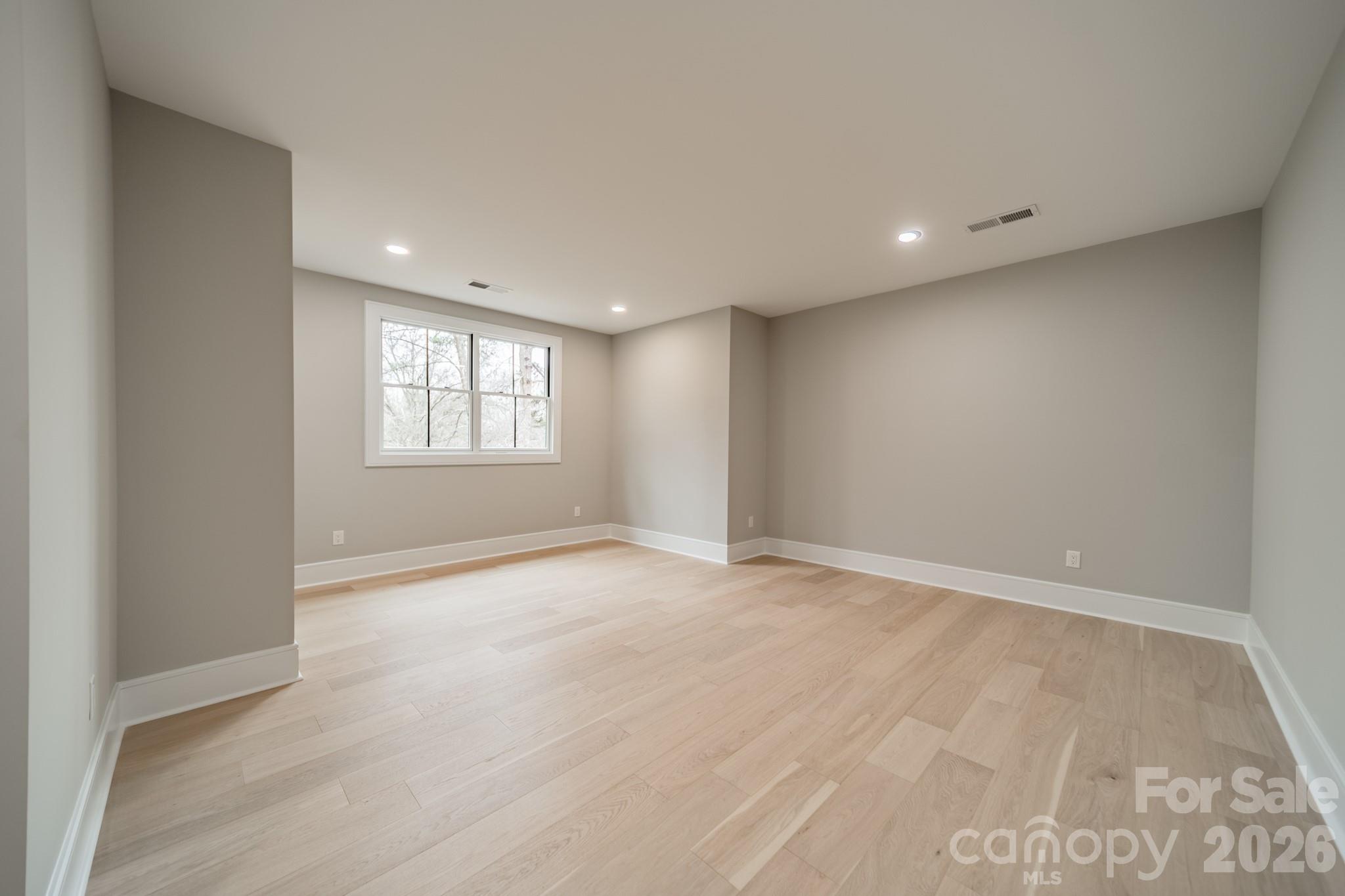 6805 Weddington Matthews Road Weddington, NC 28104 - Photo 37 of 38 a view of an empty room with a window