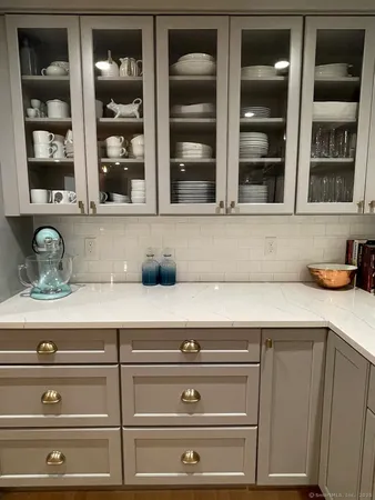a close view of closet with wooden floor