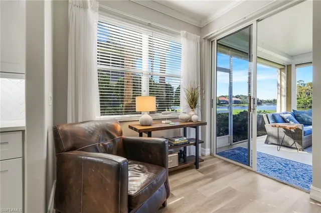 a bedroom with a bed and a table in it