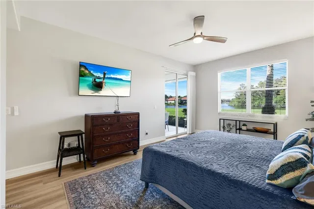 a bathroom with double vanity sink and a mirror