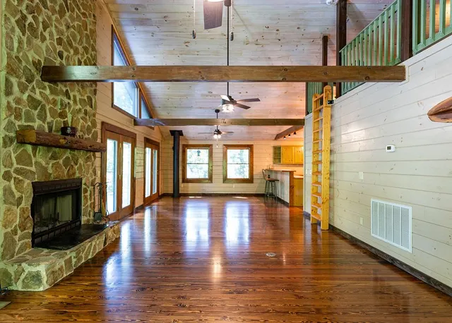 a view of a kitchen with a large window
