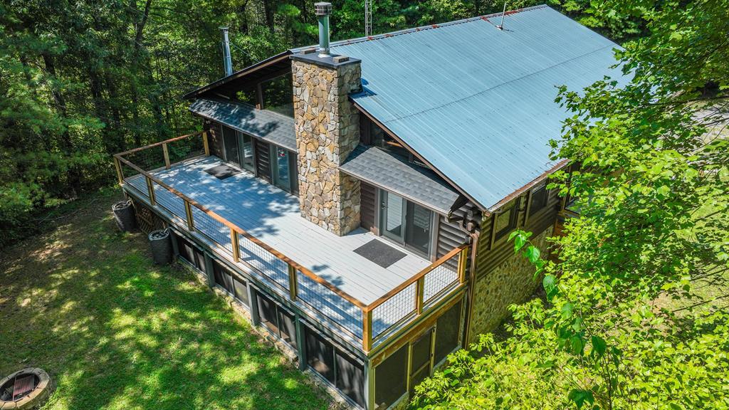192 Fingerboard Road Reliance, TN 37369 - Photo 2 of 57 an aerial view of a house with roof deck
