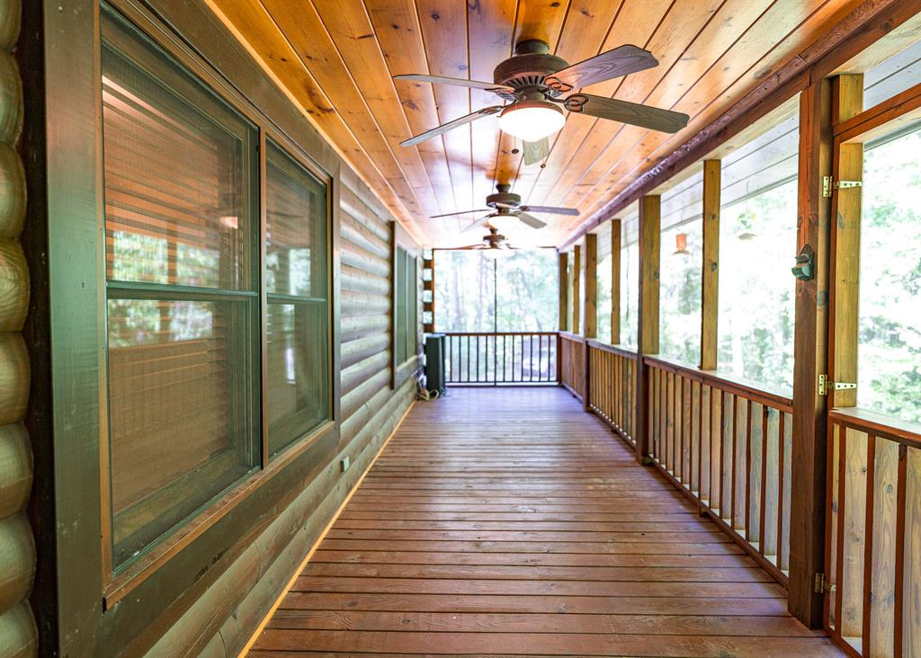 192 Fingerboard Road Reliance, TN 37369 - Photo 22 of 57 a view of a balcony with wooden floor