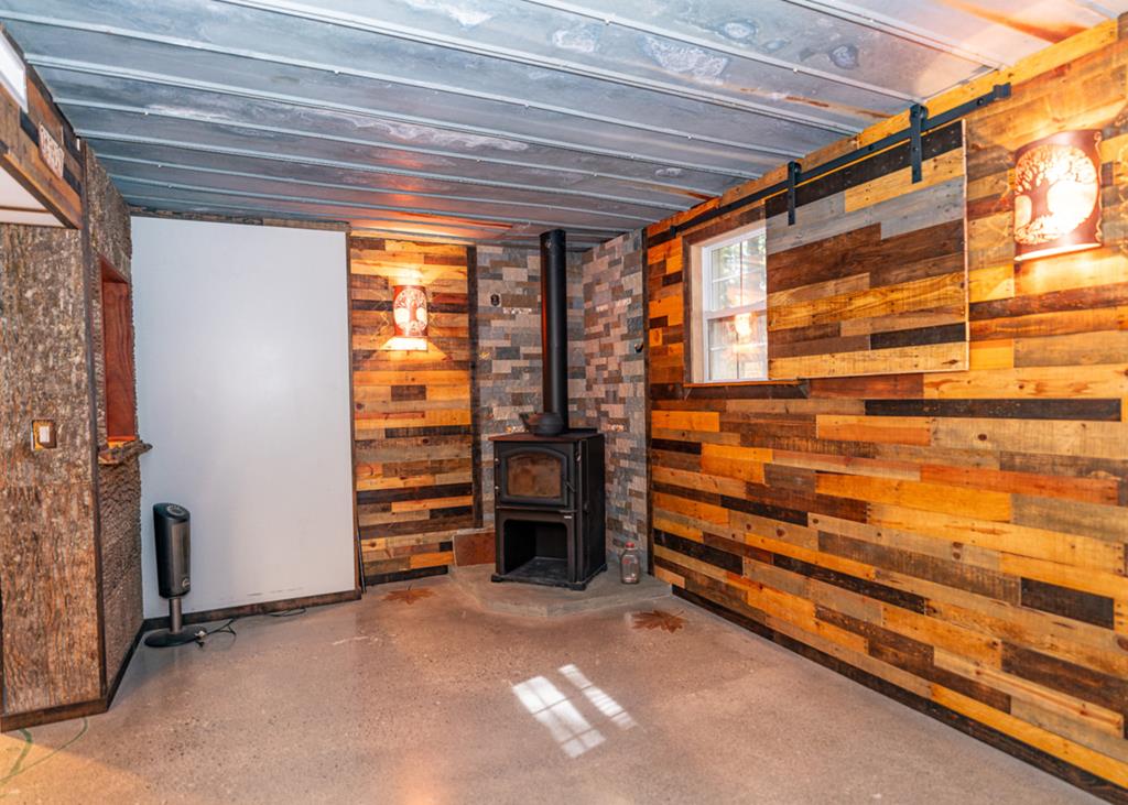 192 Fingerboard Road Reliance, TN 37369 - Photo 30 of 57 a view of walk in closet with clothes and shoes
