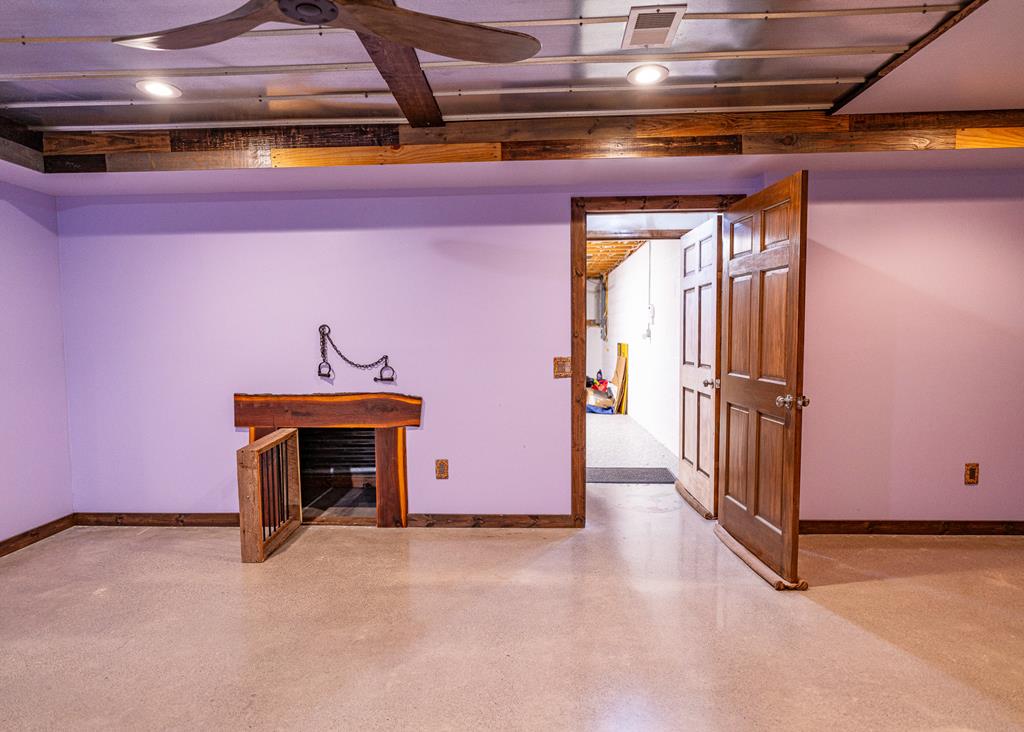 192 Fingerboard Road Reliance, TN 37369 - Photo 31 of 57 a view of a room with wooden floor