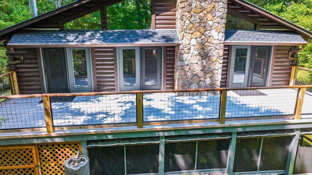 192 Fingerboard Road Reliance, TN 37369 - Photo 38 of 57 a view of a house with a window and sitting area