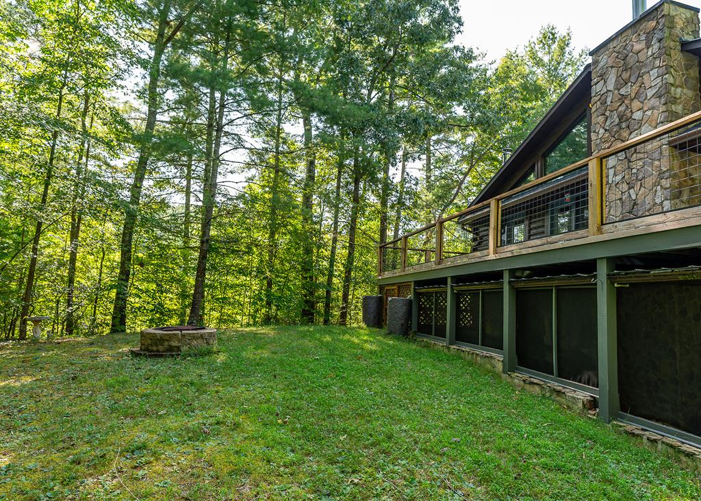 192 Fingerboard Road Reliance, TN 37369 - Photo 49 of 57 a backyard of a house with lots of green space