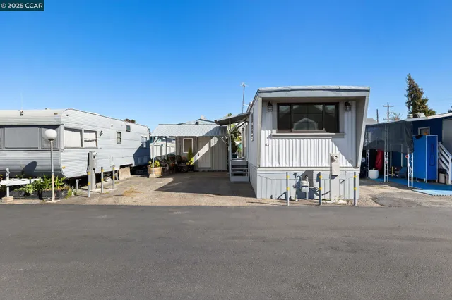 a view of a house with a street