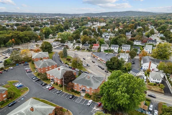 an aerial view of a city with lots of residential buildings
