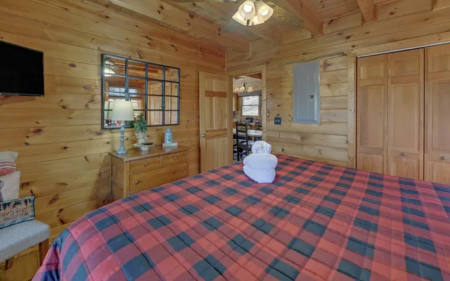 a bathroom with a sink toilet a mirror and shower