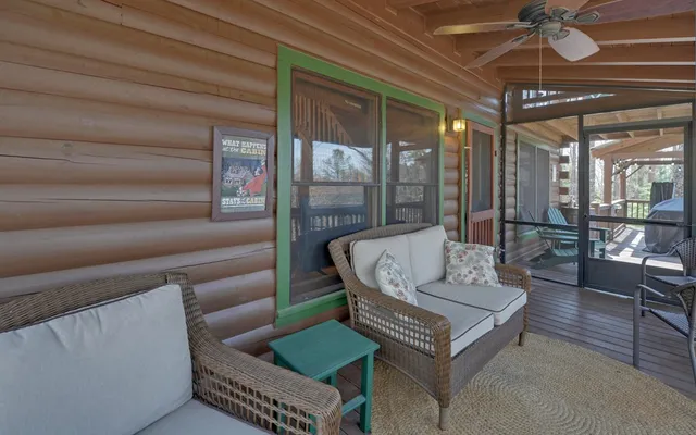 a view of balcony with furniture