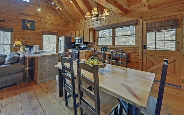 a view of porch with wooden floor