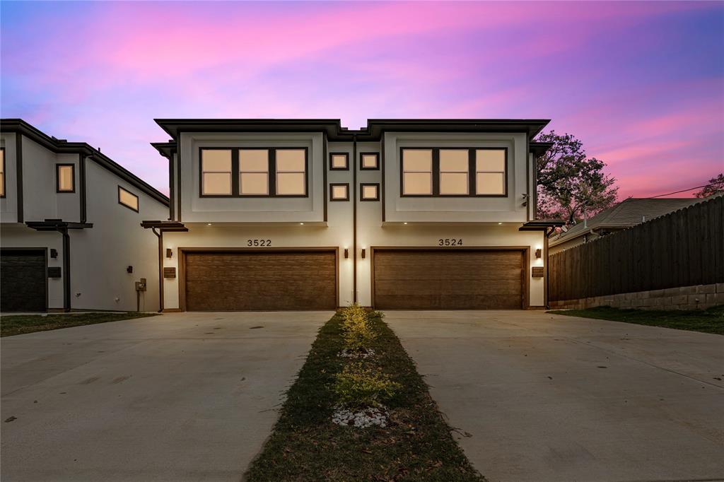 3522-3524 Parnell Street Dallas, TX 75215 - Photo 1 of 1 View of front of property featuring a garage