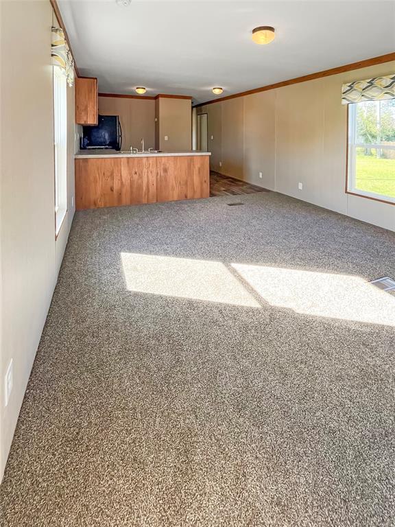 6027 Quince Street Punta Gorda, FL 33950 - Photo 4 of 18 a view of kitchen and kitchen with furniture