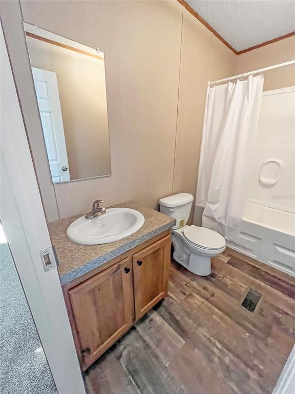 6027 Quince Street Punta Gorda, FL 33950 - Photo 6 of 18 a bathroom with a sink toilet and shower