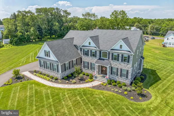 a front view of a house with a porch