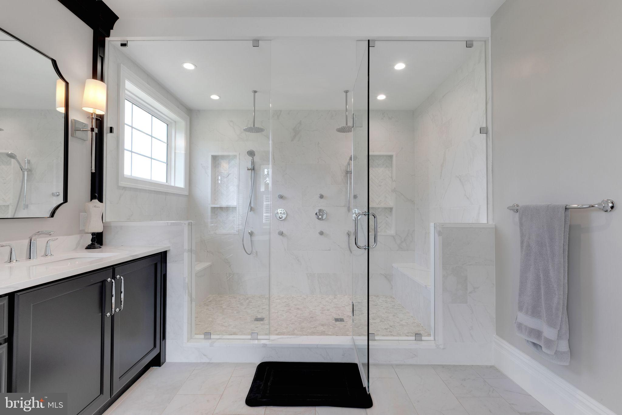 15 Marquis Ridge Holland, PA 18966 - Photo 47 of 83 a bathroom with a shower a sink and a mirror