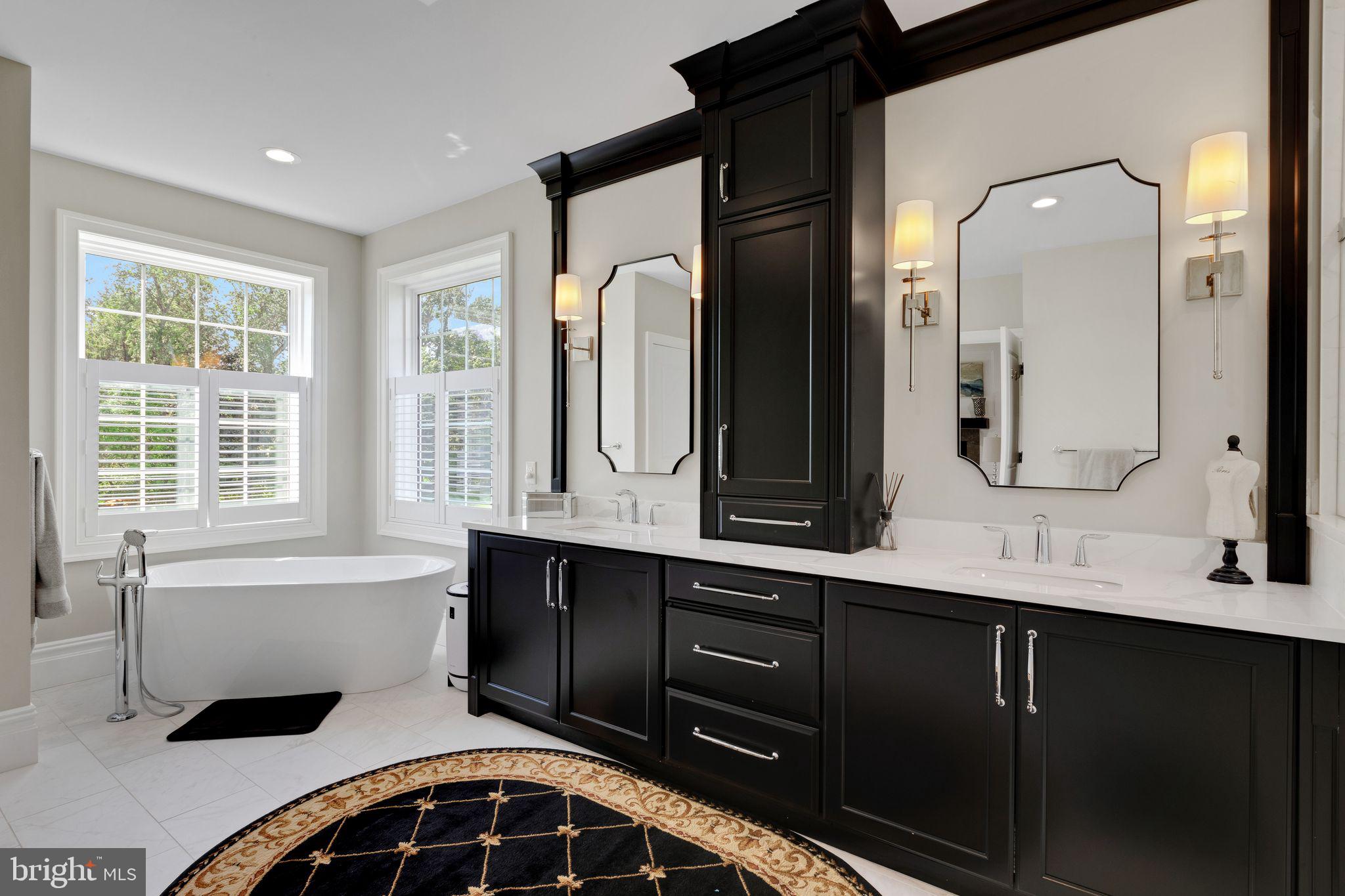 15 Marquis Ridge Holland, PA 18966 - Photo 49 of 83 a bathroom with a double vanity sink mirror and bathtub