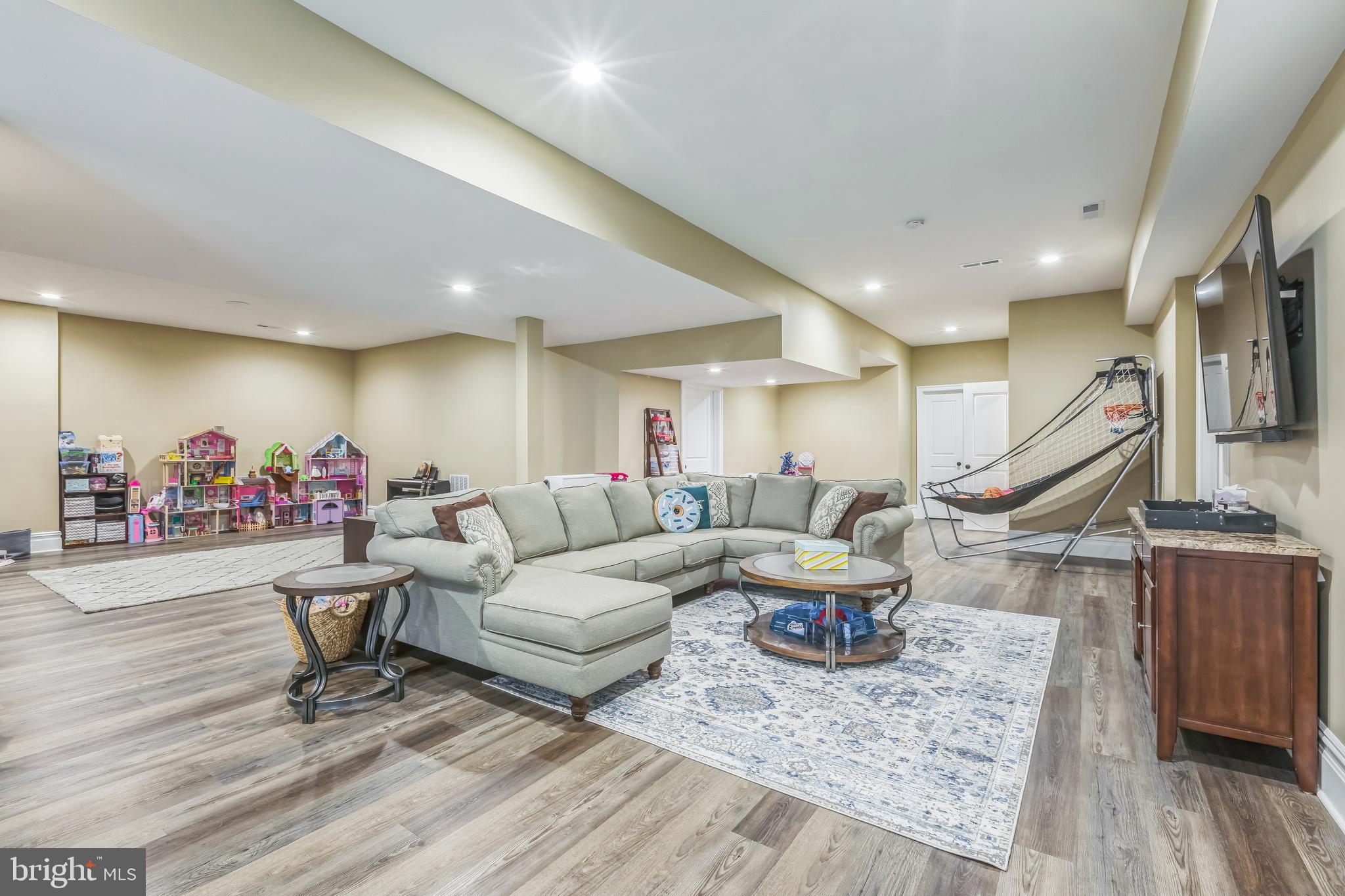 15 Marquis Ridge Holland, PA 18966 - Photo 65 of 83 a living room with furniture and wooden floor