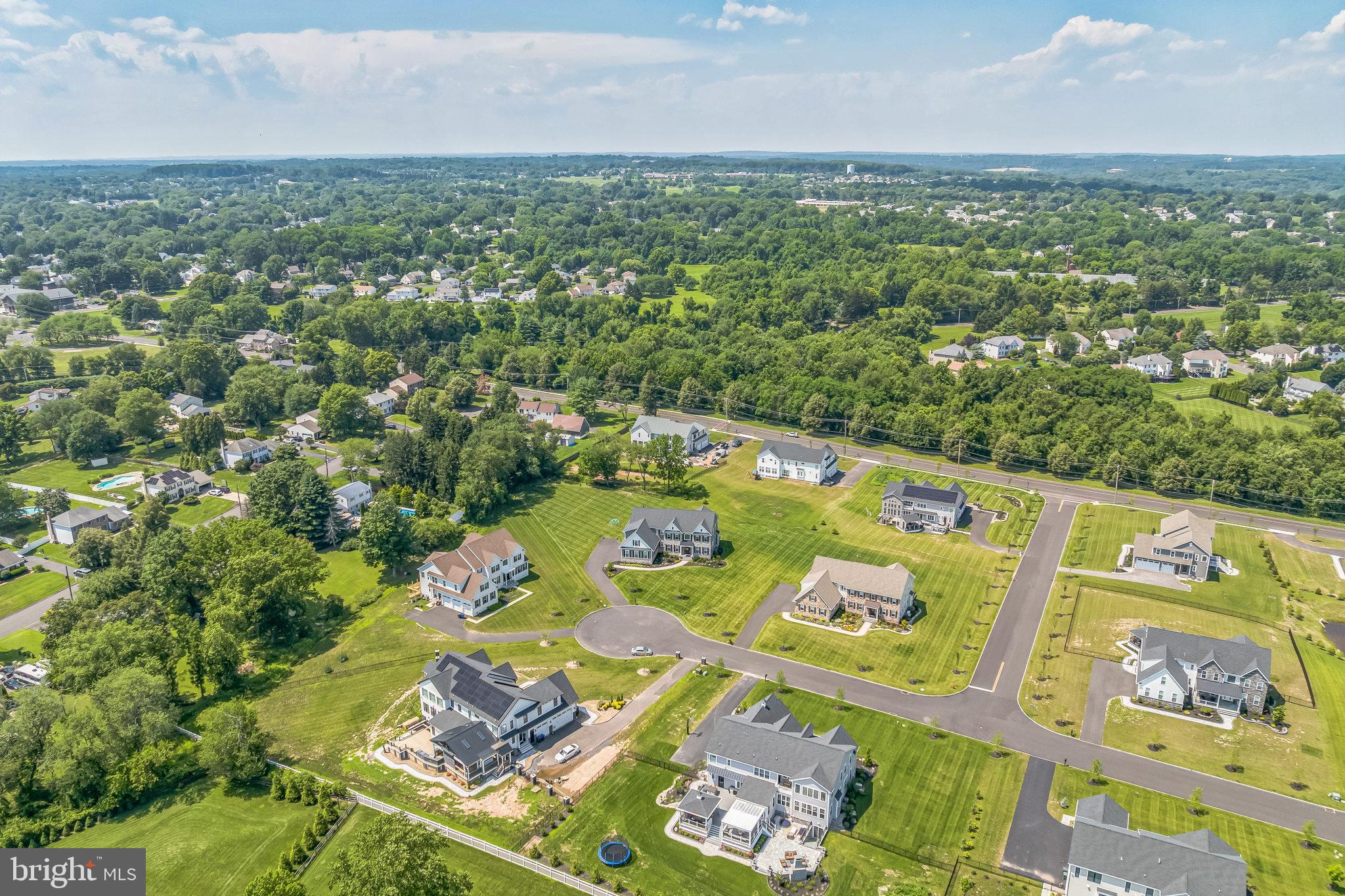 15 Marquis Ridge Holland, PA 18966 - Photo 70 of 83 an aerial view of a residential houses with outdoor space and trees