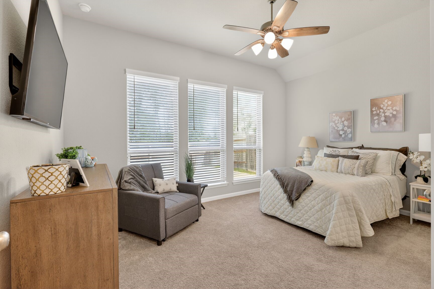11231 Burgus Farm Road Humble, TX 77346 - Photo 14 of 28 This expansive retreat offers plenty of space for a king-sized bed and a separate sitting area, creating a private haven within the home.