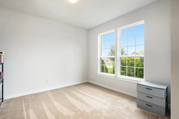 an empty room with a window