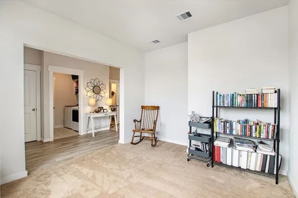 a view of a workspace with furniture and a livingroom