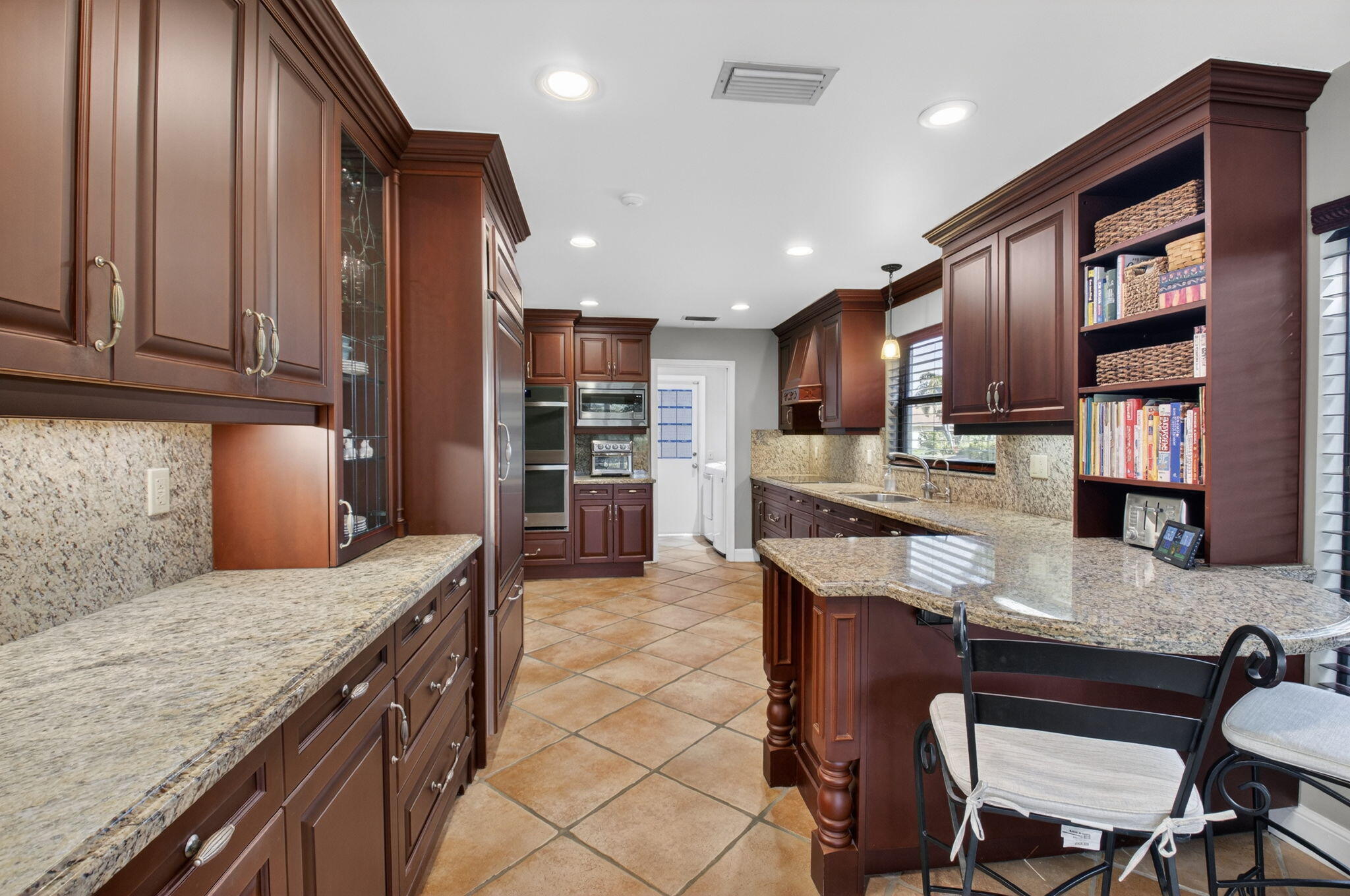 5470 Northwest 3rd Terrace Boca Raton, FL 33487 - Photo 24 of 71 KITCHEN WITH SNACK BAR