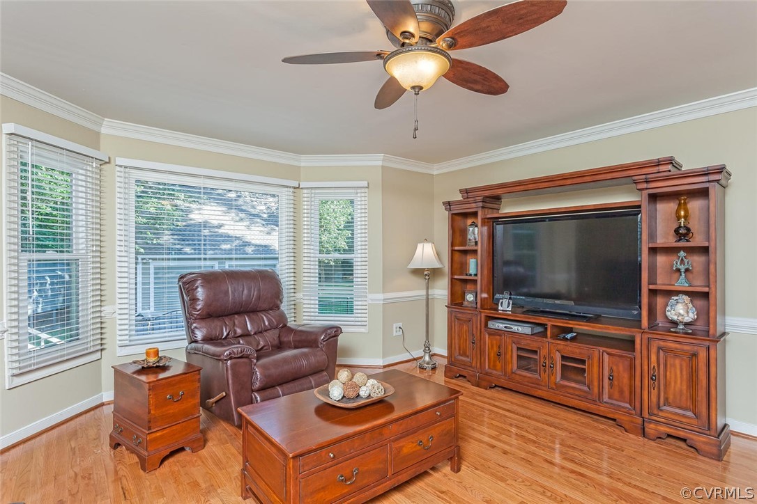 5710 Deep Forest Road Richmond, VA 23237 - Photo 18 of 40 a living room with furniture and a flat screen tv